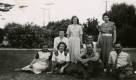 Back row from left: Dot, Barb, Mick (crouching), Kath. Front row from left: Bette, Jo, Alf and family friend Harry Crook