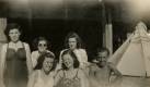 Kath, Bette, Barb, Jo with unknown couple