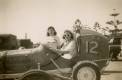 Kath standing alongside Jo seated in Alf’s Speed Car No 12